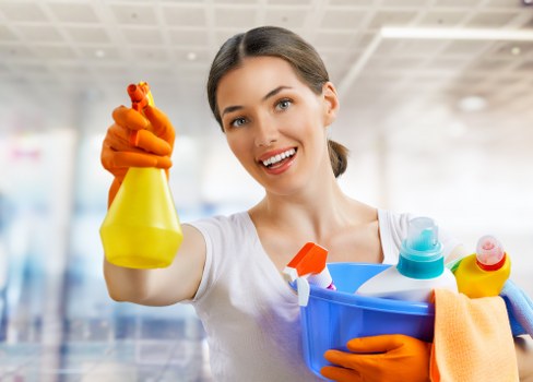 Cleaner working in a Croydon CR0 flat kitchen and living space