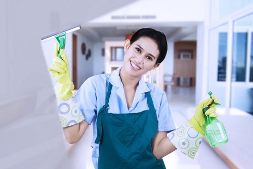 Local oven cleaner working in a Croydon flat kitchen